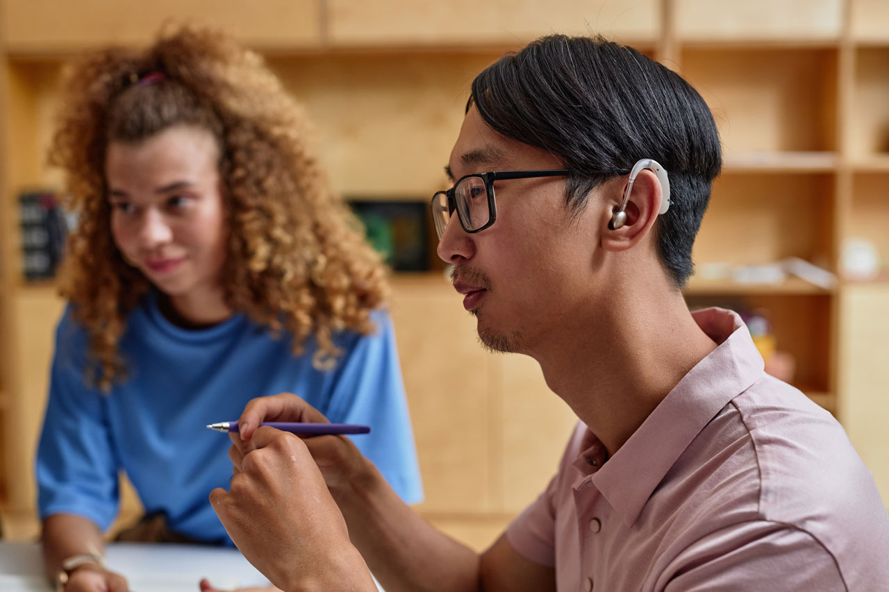 asian student in group discussion